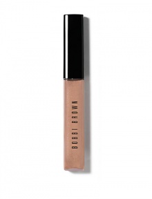 Bobbi has sized up all her glosses to give you an extra dose of shine. Shimmer Lip Gloss offers beautiful, non-sticky shine with a touch of iridescence and is perfect on its own or over your favorite lipstick. Formulated with Aloe Extract to soothe and soften lips; Vitamins C and E for anti-oxidant protection; and Jojoba and Avocado Oils to moisturize lips. 0.24 oz. Bobbi has sized up all her glosses to give you an extra dose of shine. Shimmer Lip Gloss offers beautiful, non-sticky shine with a touch of iridescence and is perfect on its own or over your favorite lipstick. Formulated with Aloe Extract to soothe and soften lips; Vitamins C and E for anti-oxidant protection; and Jojoba and Avocado Oils to moisturize lips. 0.24 oz.