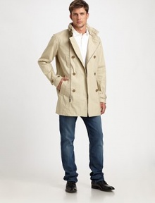 Traditional outerwear staple with modern details, takes this classic trench to the next level of style with zipper accents that are both versatile and functional.Zip frontSide slash pocketsRear ventPartial liningAbout 36 from shoulder to hemCottonDry cleanImported