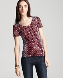 A singular vision of fall style, this vibrant MARC BY MARC JACOBS printed top boldly blends the season's chicest patchwork prints for a fresh weekend look. A singular vision of fall style, this vibrant MARC BY MARC JACOBS printed top boldly blends the season's chicest patchwork prints for a fresh weekend look.