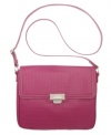 For that tech-savvy girl on-the-go, this signature 9 embossed iPad crossbody from Nine West is a fashion 10.  Polished silver-tone hardware complements the delicate detail stitching, while the fully lined interior safely stows iPad and other essentials with ease.
