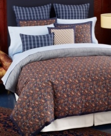 Inspired by classic Tommy Hilfiger style, this Shelburne Paisley comforter set features a landscape of printed multicolor paisley designs surrounded by a solid navy frame border. The set reverses to chambray blue with a navy pinstripe pattern.