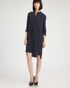 This modern silk shirtdress is tailored with a fluid, relaxed fit.Band collarFront button placket with detached tab detailButton patch flap pocketsLong sleeves with button cuffsVented asymmetrical hemlineGathers at back yokeAbout 26 from natural waist53% silk/47% acetateDry cleanImported of Italian fabricModel shown is 5'9 (175cm) wearing US size 4. 