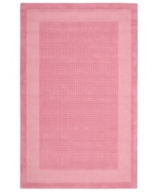 In playful pink, this charming rug will warm up any space in your home. A distinctive center grid gives the rug a delightful texture while coordinating well with casual and modern interiors. Hand-tufted of wool for premium softness and durability.
