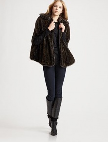 The ease of a poncho paired with the luxury of lush faux fur.Point collar Dropped shoulders Open sleeves About 27 from shoulder to hem 82% modacrylic/18% polyester Dry clean Imported Model shown is 5'10 (178cm) wearing US size Small. The ease of a poncho paired with the luxury of lush faux fur.Point collar Dropped shoulders Open sleeves About 27 from shoulder to hem 82% modacrylic/18% polyester Dry clean Imported Model shown is 5'10 (178cm) wearing US size Small.