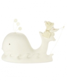 A fun-loving whale offers a first-class ride to this bundled-up-baby, taking ice fishing to new heights. Crafted of porcelain bisque from Department 56.