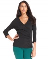 The basic top gets revamped with gathers at the side and a chic surplice neckline in this look from Charter Club.