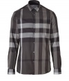 Work an iconic edge into your contemporary separates with Burberry Londons sharp cotton check shirt, finished with a French placket for a flawless look - Small cutaway collar, long sleeves, buttoned cuffs, button-down front - Modern slim cut - Wear with everything from pullovers and jeans to slim tailored suits