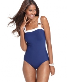 Only at Macy's, square hardware buckles add a splash of style to this Magicsuit one-piece swimsuit -- tummy control ensures a sleek seaside look! Only at Macy's, square hardware buckles add a splash of style to this Magicsuit one-piece swimsuit -- tummy control ensures a sleek seaside look!