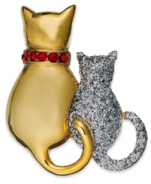 A pair of feline pals add a darling finish. This Charter Club pin adds sass with silvery glitter and red accents. Crafted in gold tone mixed metal. Approximate length: 1-1/2 inches. A pair of feline pals add a darling finish. This Charter Club pin adds sass with silvery glitter and red accents. Crafted in gold tone mixed metal. Approximate length: 1-1/2 inches.
