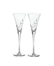 A delicate, etched vine motif and elongated stems on this set of toasting flutes infuse celebratory moments with unparalleled sophistication. Qualifies for Rebate A delicate, etched vine motif and elongated stems on this set of toasting flutes infuse celebratory moments with unparalleled sophistication. Qualifies for Rebate