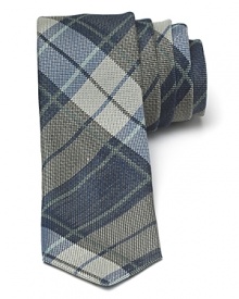 A smart check pattern offers a classic design in a modern skinny shape for an overall super-cool tie from John Varvatos Star USA. A smart check pattern offers a classic design in a modern skinny shape for an overall super-cool tie from John Varvatos Star USA.