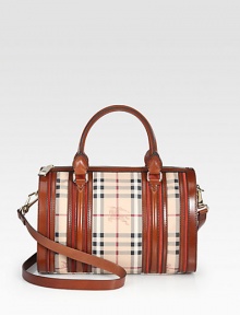 Luxurious leather accents this coated canvas style with an iconic haymarket check print.Double leather top handles, 5 dropDetachable adjustable leather shoulder strap, 20-23 dropTop zip closureOne inside zip pocketTwo inside open pocketsCotton lining12½W X 8½H X 7DImported