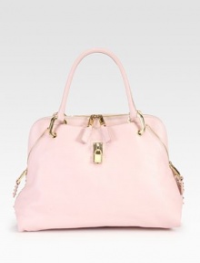 A chic and feminine style in supple leather with shiny, pyramid stud accents.Double top handles, 6½ dropTop zip closureTwo outside open pocketsOne inside zip pocketOne inside open pocketSuede lining16W X 11½H X 5DMade in Italy A chic and feminine style in supple leather with shiny, pyramid stud accents.Double top handles, 6½ dropTop zip closureTwo outside open pocketsOne inside zip pocketOne inside open pocketSuede lining16W X 11½H X 5DMade in Italy