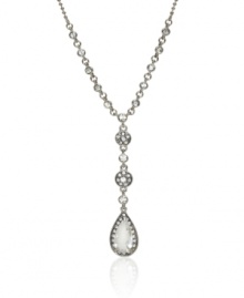 Accentuate your neckline with this daring pendant from Monet. Crafted in silvertone mixed metal, pendant is composed of circular, crystal-accented medallions leading to a radiant pear-shaped crystal. Approximate length: 16 inches + 2-inch extender. Approximate drop: 2-1/4 inches.