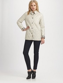 Quilted with cozy style in mind, this design is also super lightweight.Stylized collarSnap closurePatch pocketsButton details on back hemAbout 25 from shoulder to hemNylonDry cleanImported Model shown is 5'9 (176cm) wearing US size Small. Quilted with cozy style in mind, this design is also super lightweight.Stylized collarSnap closurePatch pocketsButton details on back hemAbout 25 from shoulder to hemNylonDry cleanImported Model shown is 5'9 (176cm) wearing US size Small.