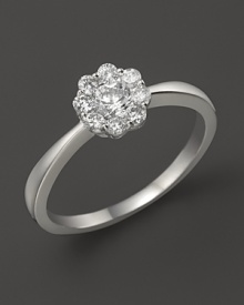 Faceted diamonds in 14K white gold flower setting.