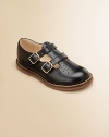 An English-style leather wardrobe staple that's perfect for school, play and parties.Twin T-straps with adjustable bucklesLeather upperLeather liningRubber solePadded insoleImported Please note: It is recommended that you order ½ size smaller than measured. If your child measures a size 7.0, you may want to order a 6½. 