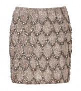 Channel the look of vintage glamour in Collette Dinnigans immaculately beaded champagne silk skirt - Hidden side zip, mini-length - Fitted - Wear with a silk blouse and sleek suede heels