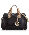 Get your shine on with this posh, patent leather purse from MICHAEL Michael Kors. Signature circular pattern and gleaming golden hardware lend a luxe look, while the generous interior lets you stow all your essentials with practical perfection.