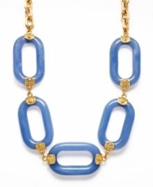 Top the trend charts with this bold statement necklace by Kenneth Jay Lane. A perfect addition to your spring collection, let these bright blue, acrylic ovals frame your neckline. Crafted in gold tone mixed metal. Approximate length: 22 inches.