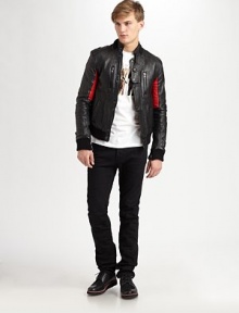 A brilliant combination of the musicians' fashion sensibility and the design team's creative direction, this signature jacket crafted in pebbled leather with contrasting inset lends a sleek, edgy appeal.Zip frontStand collarChest, waist welt pocketsRibbed knit collar, cuffs and hemInset ribbed detailAbout 25 from shoulder to hemLeatherDry cleanImported A brilliant combination of the musicians' fashion sensibility and the design team's creative direction, this signature jacket crafted in pebbled leather with contrasting inset lends a sleek, edgy appeal.Zip frontStand collarChest, waist welt pocketsRibbed knit collar, cuffs and hemInset ribbed detailAbout 25 from shoulder to hemLeatherDry cleanImported