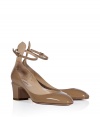 With their flawless nude patent leather and sweet rounded toe, Valentinos modern cut chunky heel pumps count as a wear-everywhere must - Rounded toe, buckled ankle strap, low-cut sides, blocky heel - Pair with everything from feminine cocktail dresses to sleek ankle trousers