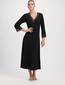Sophisticated, silky and trimmed with lace at the v-neckline.Three-quarter sleeves About 50 from shoulder to hem Polyester; machine wash Imported Sophisticated, silky and trimmed with lace at the v-neckline.Three-quarter sleeves About 50 from shoulder to hem Polyester; machine wash Imported