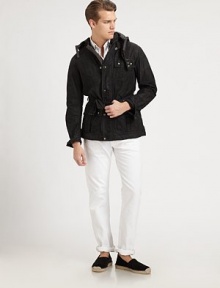This modern iteration of a classic utility jacket is crafted from sleek waxed cotton, offering rugged style and water-repellent function.Zip frontSnap button placketAttached drawstring hoodChest and waist flap pocketsBelted waistFully linedAbout 31 from shoulder to hemCottonSponge cleanImported This modern iteration of a classic utility jacket is crafted from sleek waxed cotton, offering rugged style and water-repellent function.Zip frontSnap button placketAttached drawstring hoodChest and waist flap pocketsBelted waistFully linedAbout 31 from shoulder to hemCottonSponge cleanImported