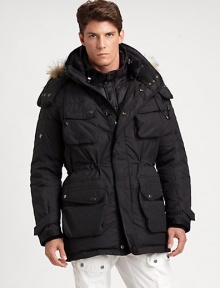 The Iditarod parka, an essential water-resistant and -repellent design for the colder months, features a multitude of pockets and an attached hood with faux-fur trim for a truly utilitarian feel.Zip frontSnap-button placketDetachable drawstring hoodDetachable faux-fur trimChest, hip flap pocketsFully linedAbout 30 from shoulder to hemPolyesterMachine washImported The Iditarod parka, an essential water-resistant and -repellent design for the colder months, features a multitude of pockets and an attached hood with faux-fur trim for a truly utilitarian feel.Zip frontSnap-button placketDetachable drawstring hoodDetachable faux-fur trimChest, hip flap pocketsFully linedAbout 30 from shoulder to hemPolyesterMachine washImported
