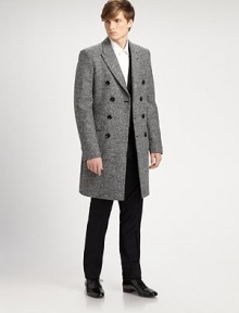 Rich wool tweed, impeccably tailored in a sleek, double-breasted style.Notched lapelDouble-breasted button frontFlap pocketsFour button detail at cuffsInverted back pleat below waistAbout 38 from shoulder to hem70% virgin wool/30% polyamideDry cleanMade in Italy Rich wool tweed, impeccably tailored in a sleek, double-breasted style.Notched lapelDouble-breasted button frontFlap pocketsFour button detail at cuffsInverted back pleat below waistAbout 38 from shoulder to hem70% virgin wool/30% polyamideDry cleanMade in Italy