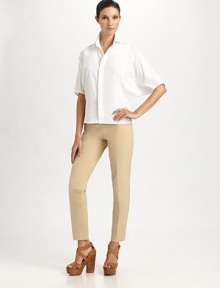 Crisp stretch cotton, in a chic, minimal style with a concealed button front placket.Shirt collarConcealed button frontWide elbow-length sleeves95% cotton/5% elastaneDry cleanImportedModel shown is 5'10 (177cm) wearing US size 4. 