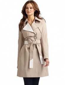 THE LOOKColorblocked notch lapelFront gun flapsDouble breasted button closureLong sleeves Self-tie colorblocked belt Side besom pocketsBack gun flapVented back hemTHE FITAbout 36 from shoulder to hemTHE MATERIAL57% cotton/43% polyesterFully linedCARE & ORIGINMachine washImportedModel shown is 5'10 (177cm) wearing US size Small. THE LOOKColorblocked notch lapelFront gun flapsDouble breasted button closureLong sleeves Self-tie colorblocked belt Side besom pocketsBack gun flapVented back hemTHE FITAbout 36 from shoulder to hemTHE MATERIAL57% cotton/43% polyesterFully linedCARE & ORIGINMachine washImportedModel shown is 5'10 (177cm) wearing US size Small.