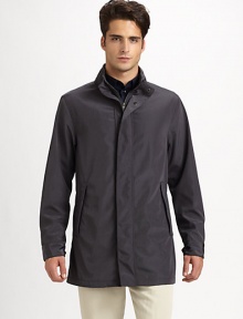 A simple silhouette that exudes the ideal balance of superior fit and functionality, expertly tailored in a water-repellent and fully-lined fabric.Zip frontSnap-button placketStand collarSide slash pocketsFully linedAbout 34 from shoulder to hemPolyesterDry cleanImported