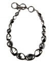 Smooth and sophisticated. With its artful array of polished beads, Jones New York's chic collar necklace is a fashionable finishing touch for your workday wardrobe. Made in hematite tone mixed metal. Approximate length: 17 inches.