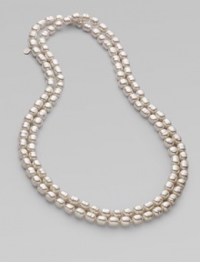 This extra-long and elegant chain of gleaming baroque pearls can be double-wrapped for versatility.10mm baroque pearls Sterling silver Length, about 60 Made in Spain