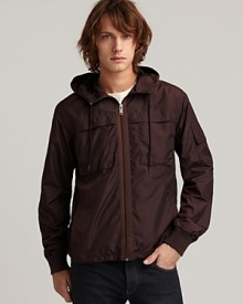A lightweight hooded jacket from MARC BY MARC JACOBS, with breathable mesh lining, adjustable hood and elastic gathers at the wrist. A lightweight hooded jacket from MARC BY MARC JACOBS, with breathable mesh lining, adjustable hood and elastic gathers at the wrist.