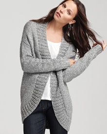 The season's favorite layer, this Theory cardigan boasts a touch of metallic sheen for a season defined by glamour.