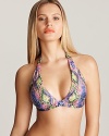 A sporty bikini top from Becca flaunts a diamond patterned, snakeskin print in vibrant neon hues.