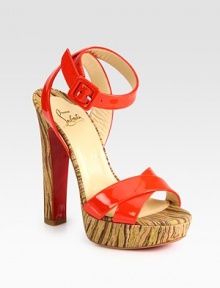 Sky-high heel and platform in an abstract print, finished with vibrant patent leather straps and a signature red leather sole. Self-covered heel, 5½ (140mm)Covered platform, 1 (25mm)Compares to a 4½ heel (115mm)Patent leather upperLeather liningSignature red leather solePadded insoleMade in Italy Sky-high heel and platform in an abstract print, finished with vibrant patent leather straps and a signature red leather sole. Self-covered heel, 5½ (140mm)Covered platform, 1 (25mm)Compares to a 4½ heel (115mm)Patent leather upperLeather liningSignature red leather solePadded insoleMade in Italy