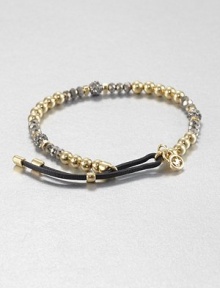 From the Brilliance Collection. A mix of silvery and golden beads includes faceted hematite, smooth gold-finished stainless steel and rhinestone-crusted spheres, strung on a stretchy strand with a leather slide close.HematiteGlassGoldtone and stainless steelLeather Diameter, about 2.25Imported From the Brilliance Collection. A mix of silvery and golden beads includes faceted hematite, smooth gold-finished stainless steel and rhinestone-crusted spheres, strung on a stretchy strand with a leather slide close.HematiteGlassGoldtone and stainless steelLeather Diameter, about 2.25Imported