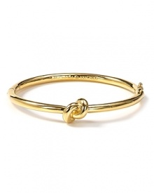 A sailor's knot bangle from kate spade new york conjures summers spent in Cape Cod cottages and East End estates.