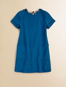 A simple shape that's oh-so ladylike, in smooth wool gabardine with shoulder epaulettes and big front pockets for a little dash.Round necklineShoulder epaulettesShort cuffed sleevesExposed back zipperOversized patch pocketsSlight A-line shapeWoolDry cleanImported