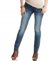 Extreme whiskering and bold topstitching enhance these medium wash skinny jeans with eye-catching style! From Dollhouse.