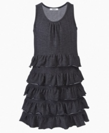 Combining the sturdy construction of denim with the floaty ruffles on this tiered dress from DKNY gives her a style that's special. Combining the sturdy construction of denim with the floaty ruffles on this tiered dress from DKNY gives her a style that's special.
