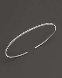 A simply modern diamond bangle in 14K white gold from Meira T.