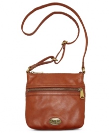 Before you head off on your next adventure, be sure to bring along this go-anywhere crossbody from Fossil. Buttery-soft leather juxtaposes with oversized zipper pulls for a look that's utilitarian-inspired yet still laid-back. Before you head off on your next adventure, be sure to bring along this go-anywhere crossbody from Fossil. Buttery-soft leather juxtaposes with oversized zipper pulls for a look that's utilitarian-inspired yet still laid-back.