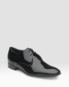 Lace-up design is expertly crafted in Italian patent leather. Leather lining and sole Padded insole Made in Italy