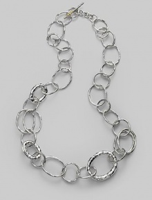 Gently hammered freeform links of sterling silver in an array of sizes and shapes give a classic chain a whole new look. Sterling silver Length, about 23 Toggle clasp Imported