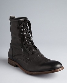Step into style with these handsome boots from John Varvatos Star USA, rendered in smooth calfskin for a polished, vintage look. Step into style with these handsome boots from John Varvatos Star USA, rendered in smooth calfskin for a polished, vintage look.