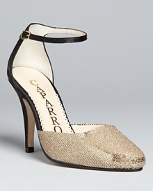 Strappy meets shine in these elegant and playful Caparros evening sandals, with thin ankle accents and boldly sequined toes. Strappy meets shine in these elegant and playful Caparros evening sandals, with thin ankle accents and boldly sequined toes.